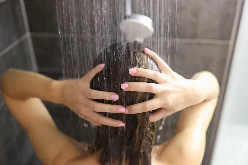 Showering under a shower head