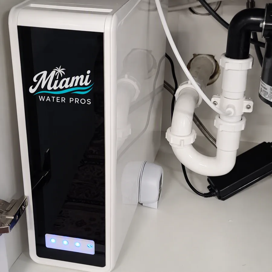 Under-sink reverse osmosis system with the Miami Water Pros logo